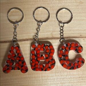 Handmade Huayruro Resin Keychain/Charm Protection & Prosperity